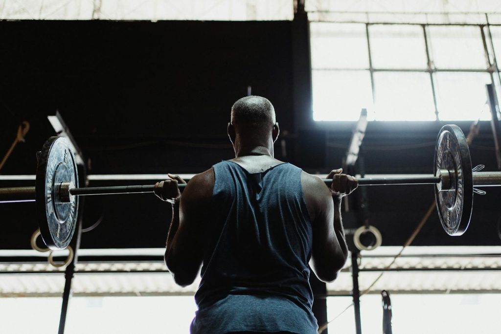 Barbell Overhead Press: Form, Muscles, Benefits, Mistakes