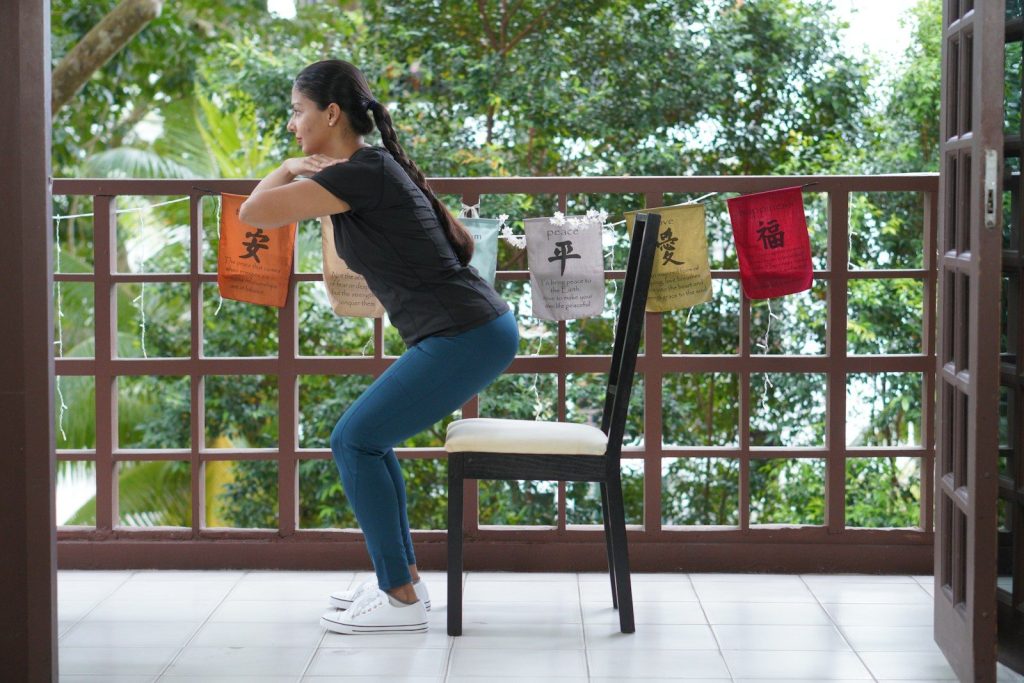 a person standing next to a chair