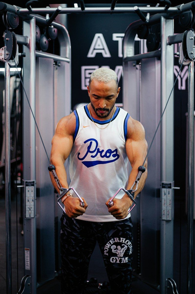 A man standing in front of a gym machine